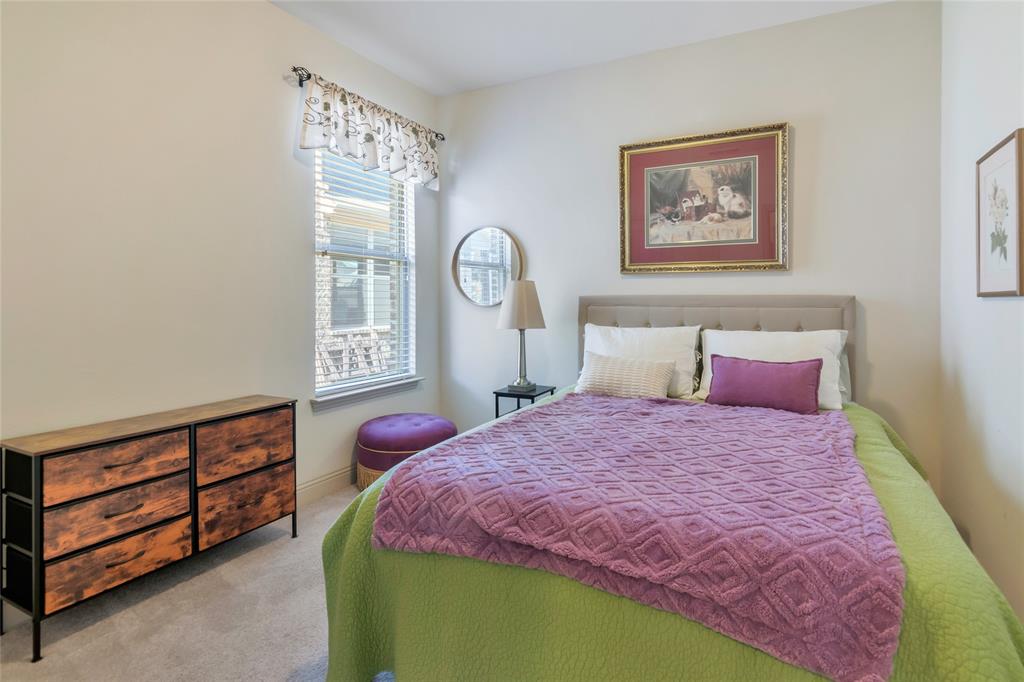1012 Sweeping Butte Drive Fort Worth, TX 76052 - Photo 16 of 23 a bedroom with a bed dresser and a window