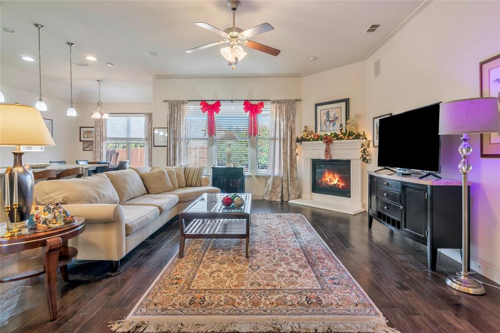 1012 Sweeping Butte Drive Fort Worth, TX 76052 - Photo 6 of 23 a living room with furniture and a flat screen tv