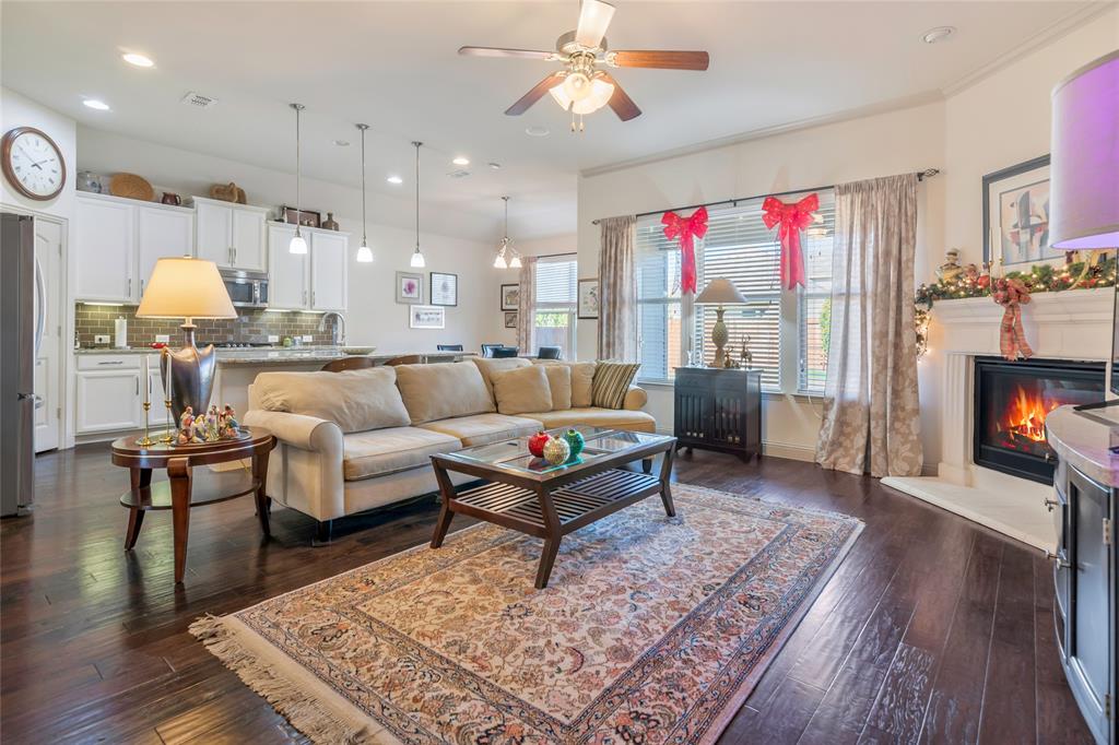 1012 Sweeping Butte Drive Fort Worth, TX 76052 - Photo 7 of 23 a living room with furniture and a fireplace