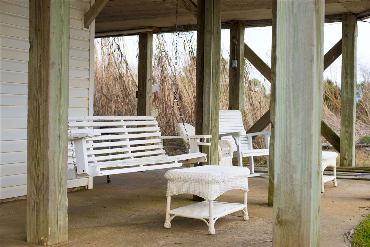 11773 County Road 1 Fairhope, AL 36532 - Photo 32 of 37 Covered Sitting Area