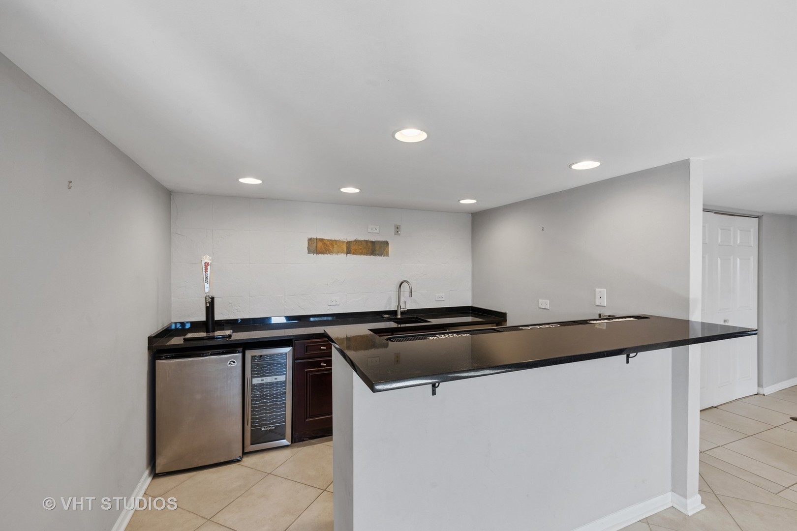 21-w064 Shelley Drive Itasca, IL 60143 - Photo 18 of 24 a close view of kitchen sink and stove
