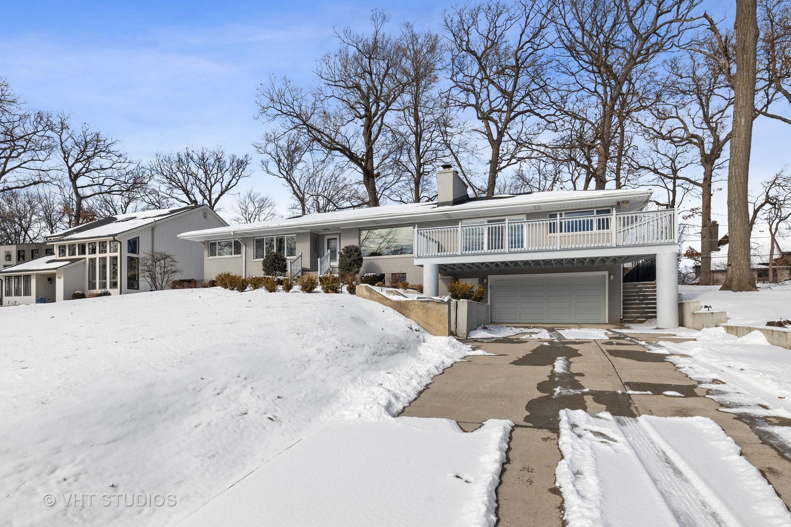 21-w064 Shelley Drive Itasca, IL 60143 - Photo 2 of 24 a view of house with yard and trees in the background
