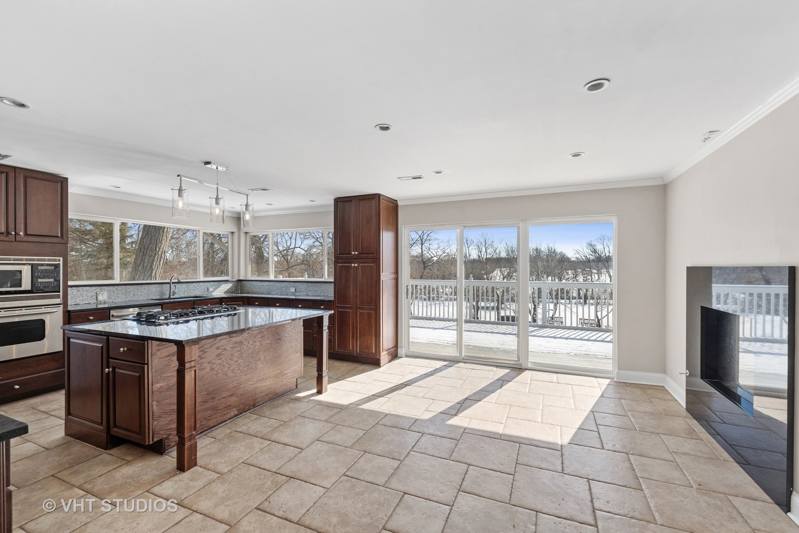 21-w064 Shelley Drive Itasca, IL 60143 - Photo 8 of 24 a kitchen with stainless steel appliances granite countertop a stove a sink and a refrigerator