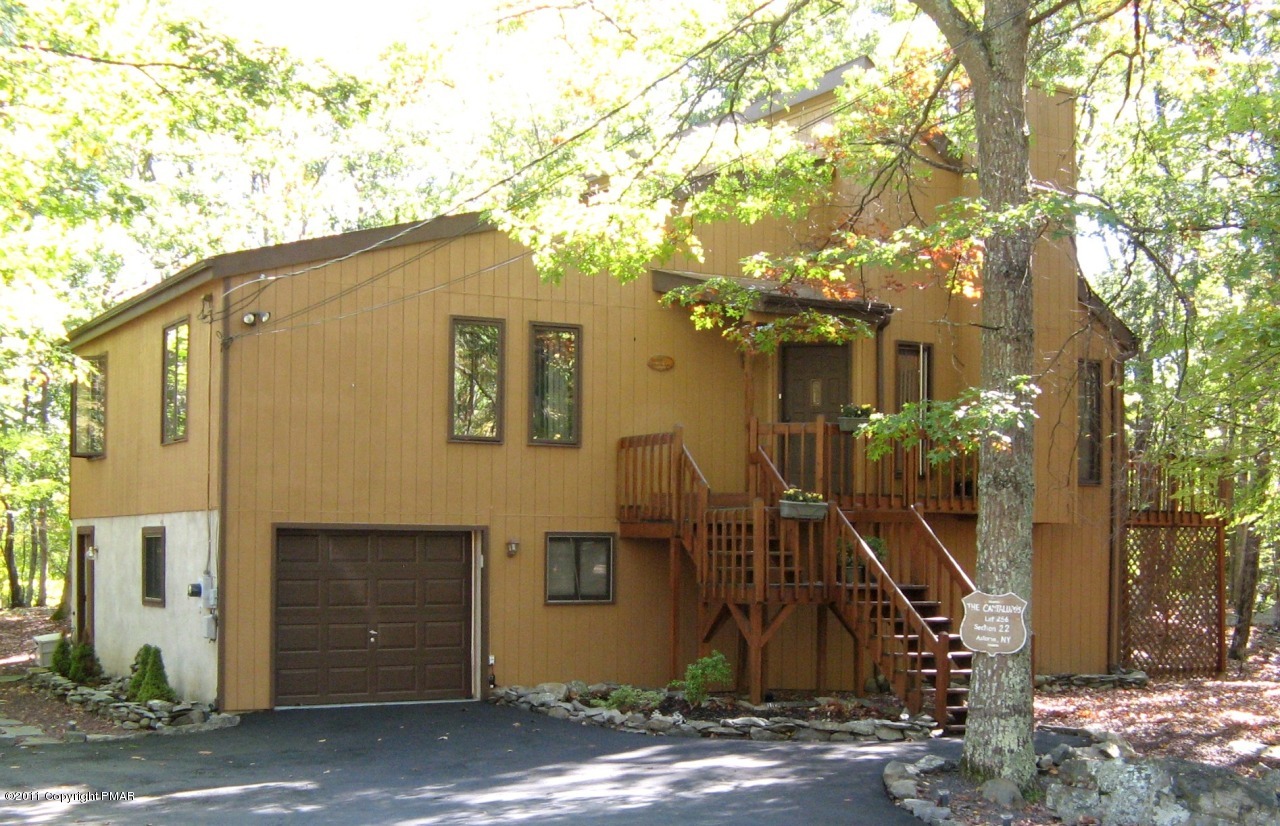 256 Decker Road Bushkill, PA 18324 - Photo 1 of 24 a view of a house with a tree