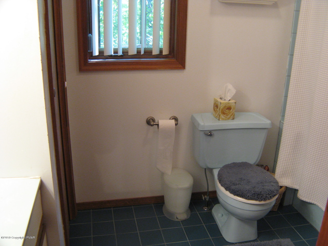 256 Decker Road Bushkill, PA 18324 - Photo 12 of 24 a toilet sitting in a bathroom next to a sink