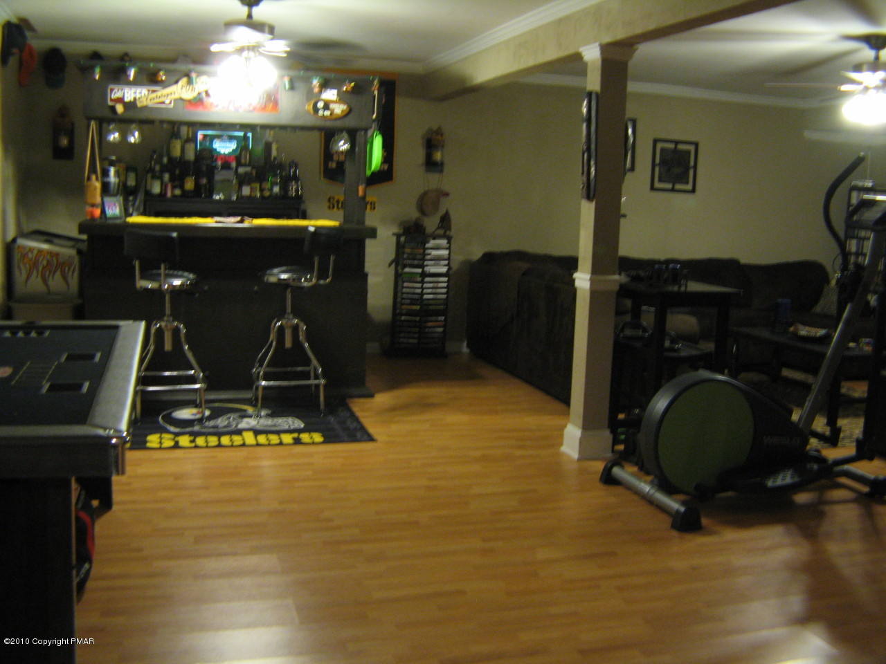 256 Decker Road Bushkill, PA 18324 - Photo 18 of 24 a room with lots of wooden furniture