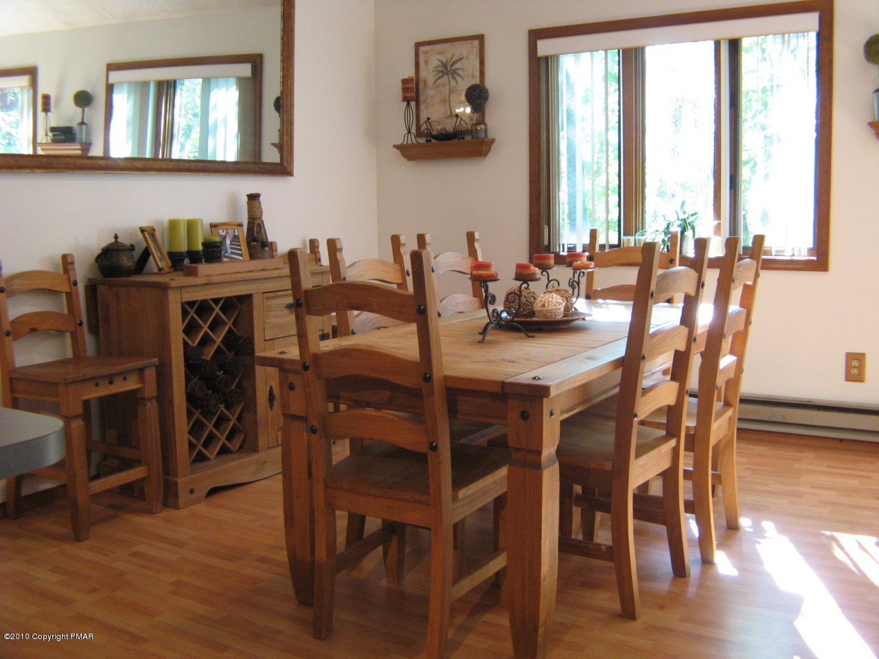 256 Decker Road Bushkill, PA 18324 - Photo 8 of 24 a view of a dining room with furniture and wooden floor