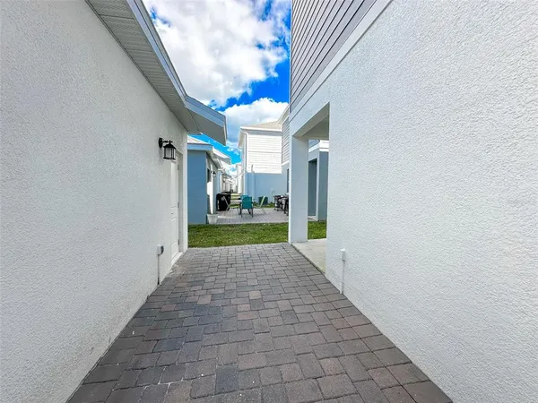 a view of a house with a yard and garage