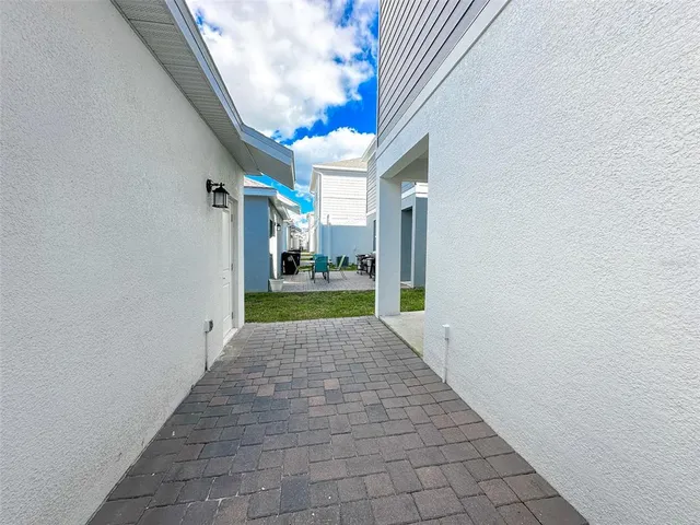 a view of a house with a yard and garage