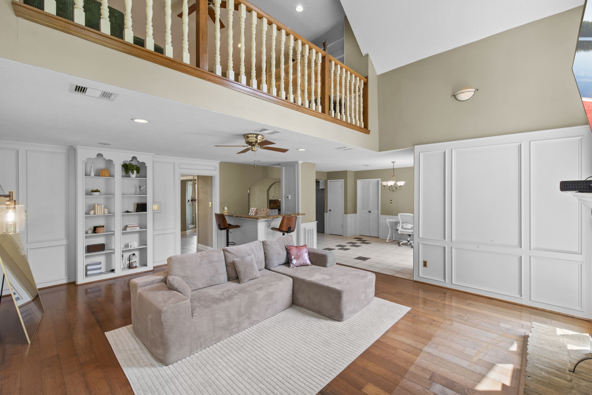 5507 Glenmere Lane Spring, TX 77379 - Photo 11 of 37 a living room with furniture and wooden floor