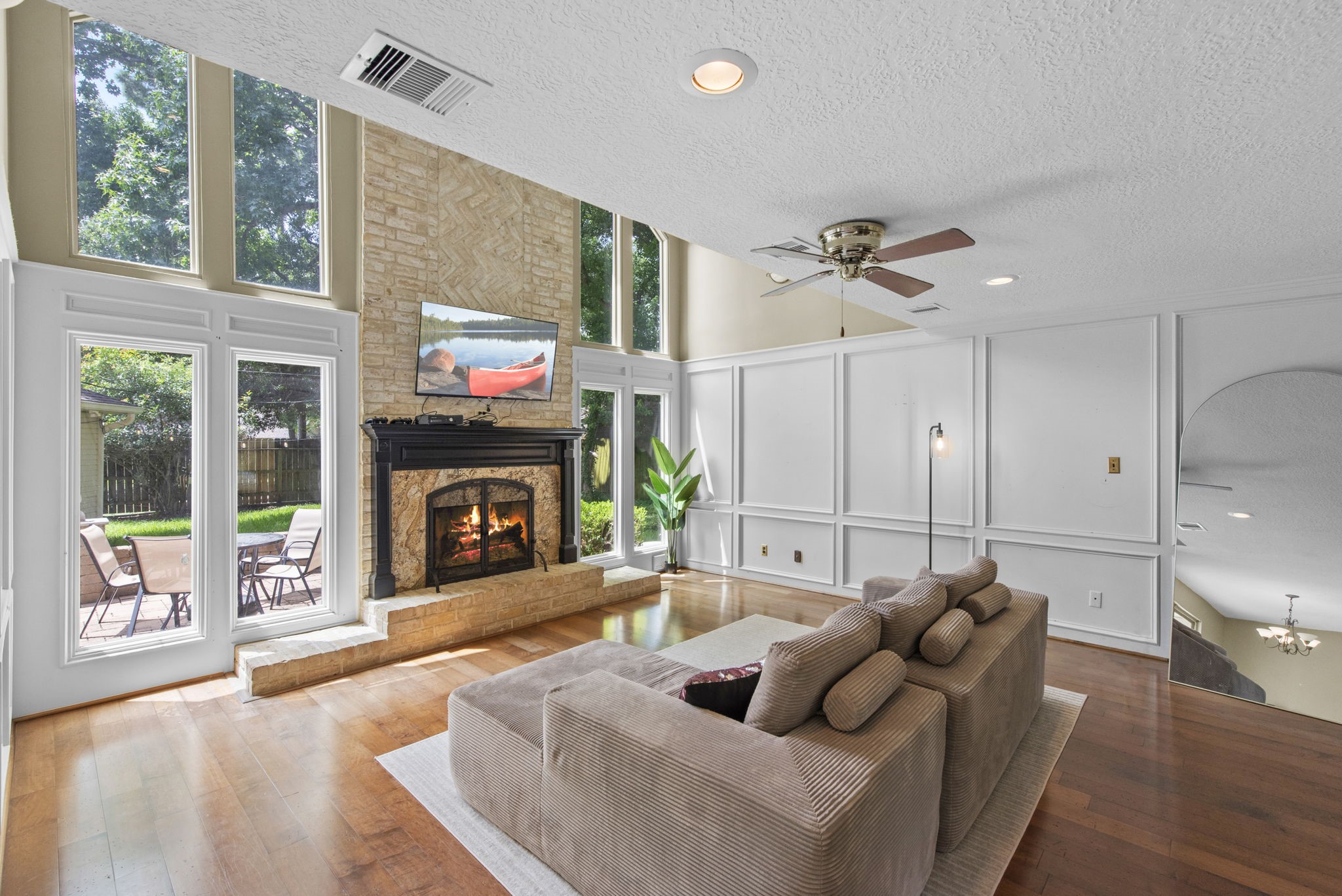 5507 Glenmere Lane Spring, TX 77379 - Photo 12 of 37 a living room with furniture and a fireplace
