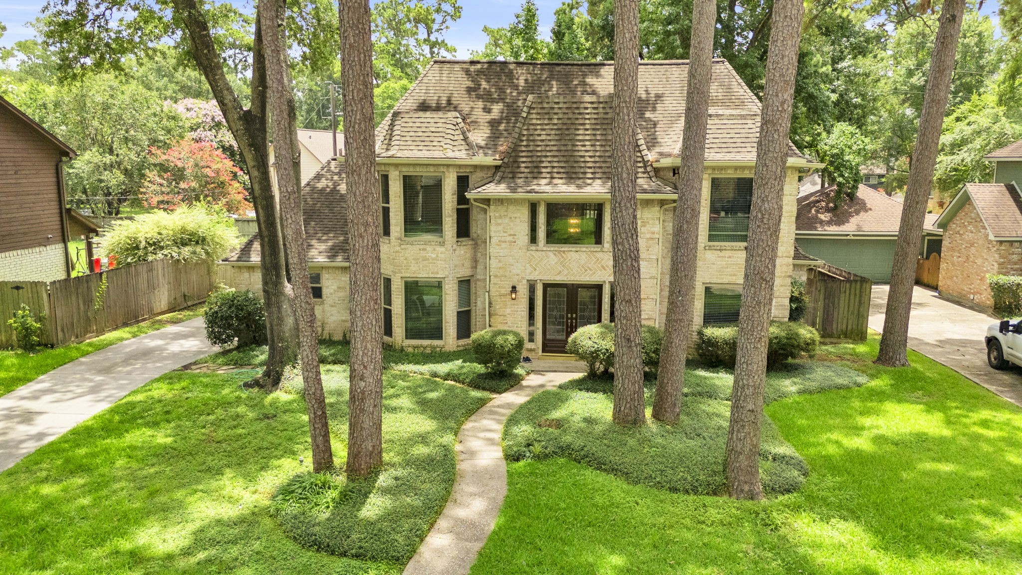 5507 Glenmere Lane Spring, TX 77379 - Photo 2 of 37 a view of backyard of house with green space