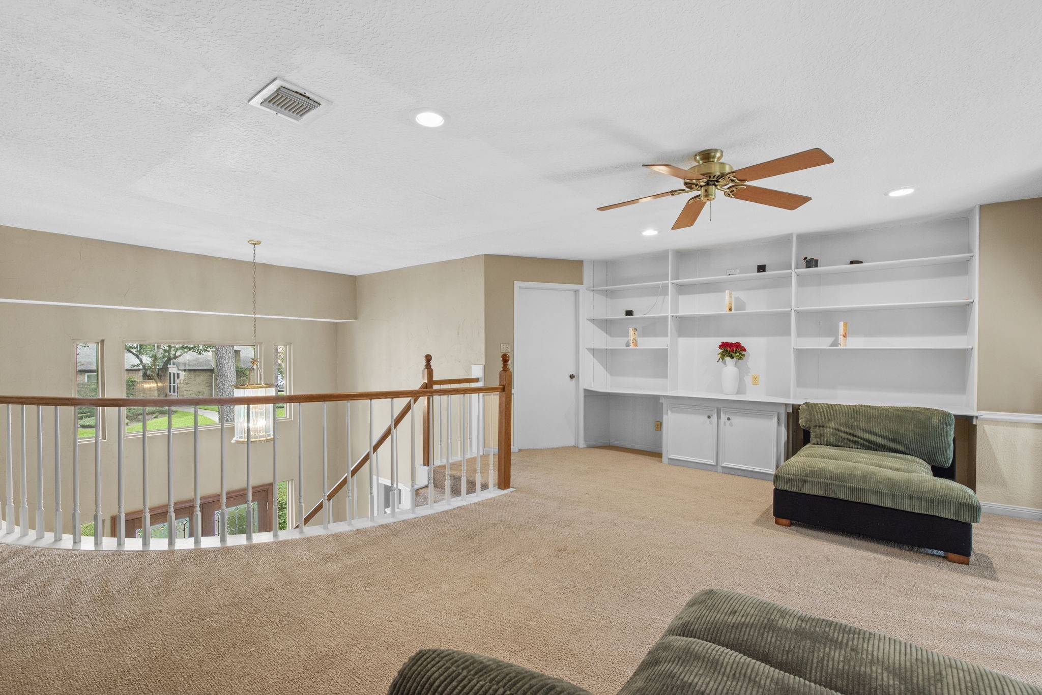 5507 Glenmere Lane Spring, TX 77379 - Photo 25 of 37 a living room with furniture and kitchen view