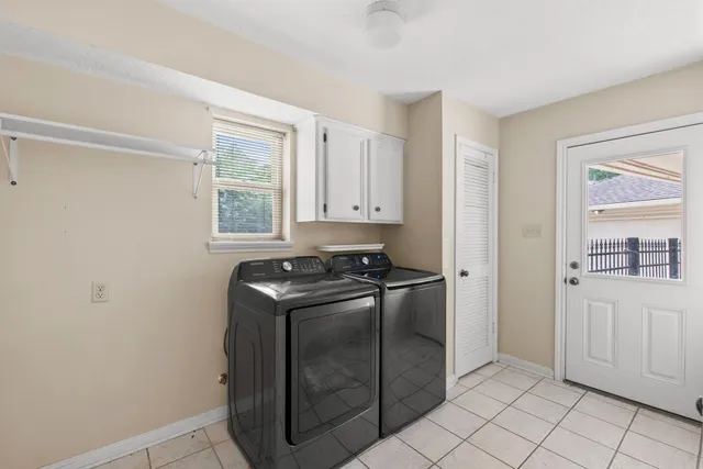 a kitchen with a stove a sink and a refrigerator