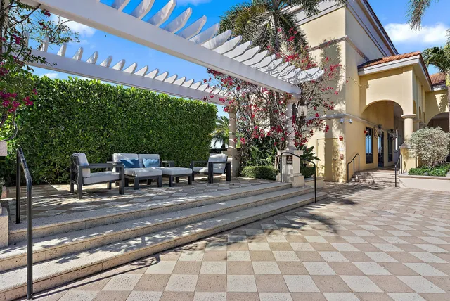 a view of a balcony with chairs