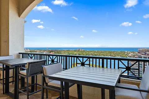 a view of swimming pool with outdoor seating and outdoor seating