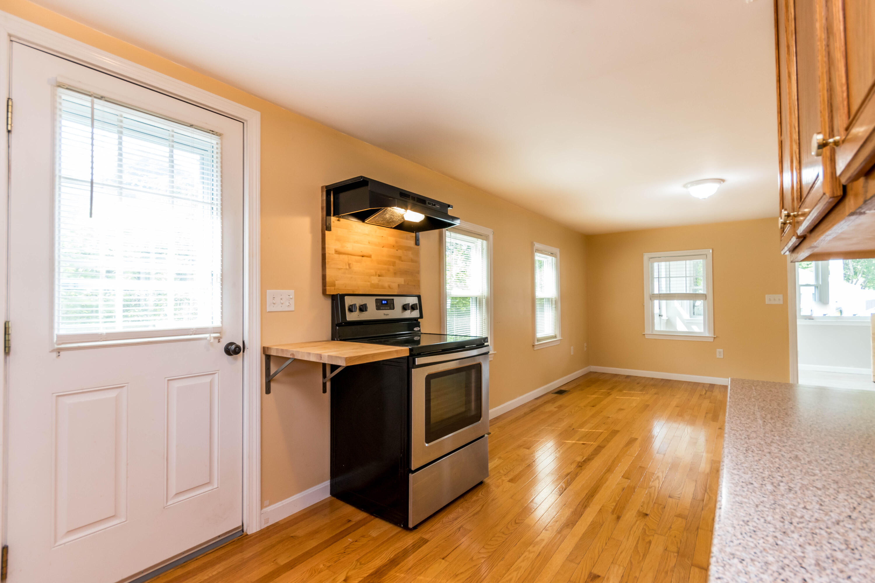 19 Monack Road Wareham, MA 02532 - Photo 10 of 24 a view of a kitchen counter space wooden floor and windows