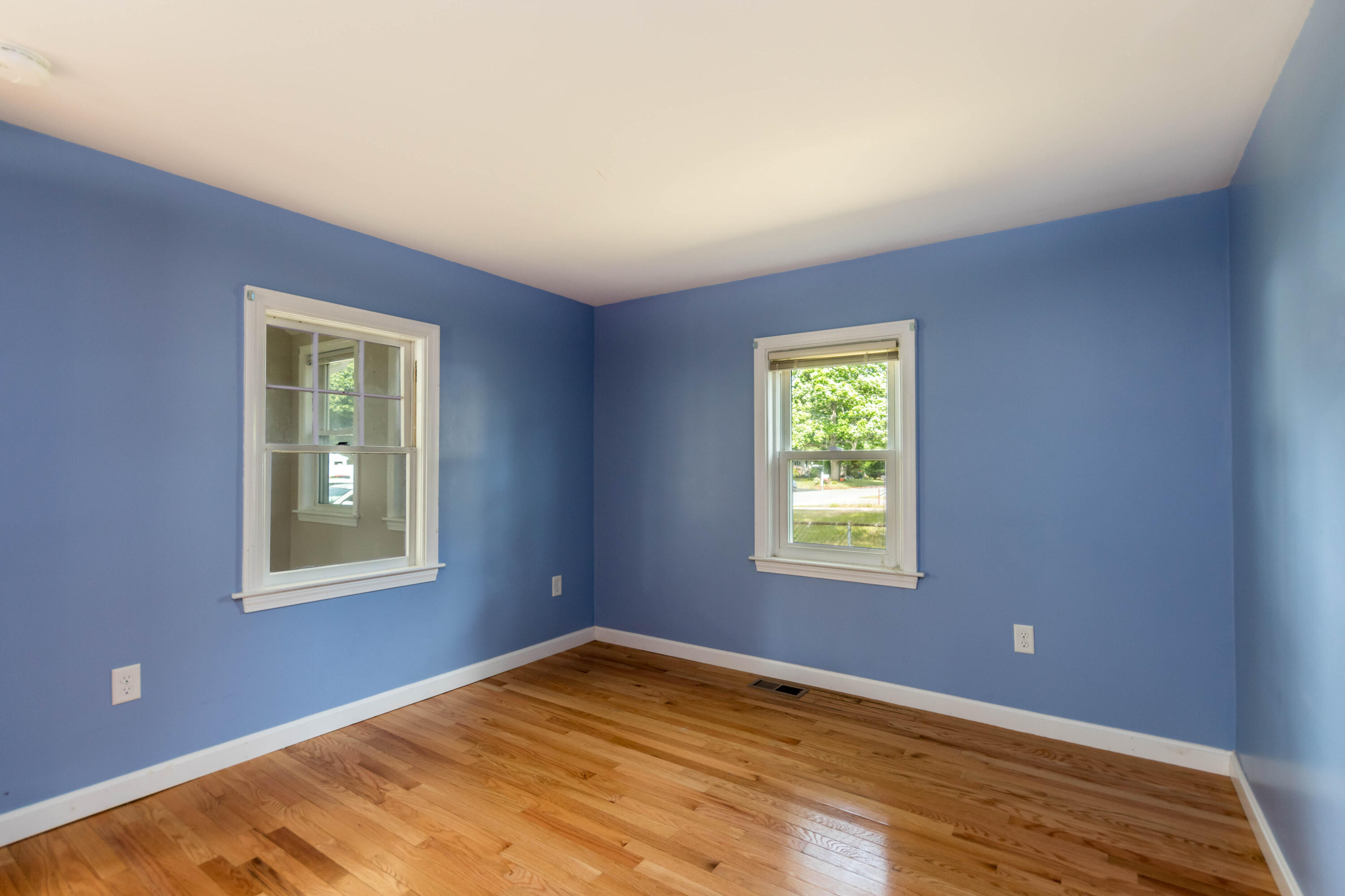 19 Monack Road Wareham, MA 02532 - Photo 11 of 24 a view of an empty room with window and wooden floor