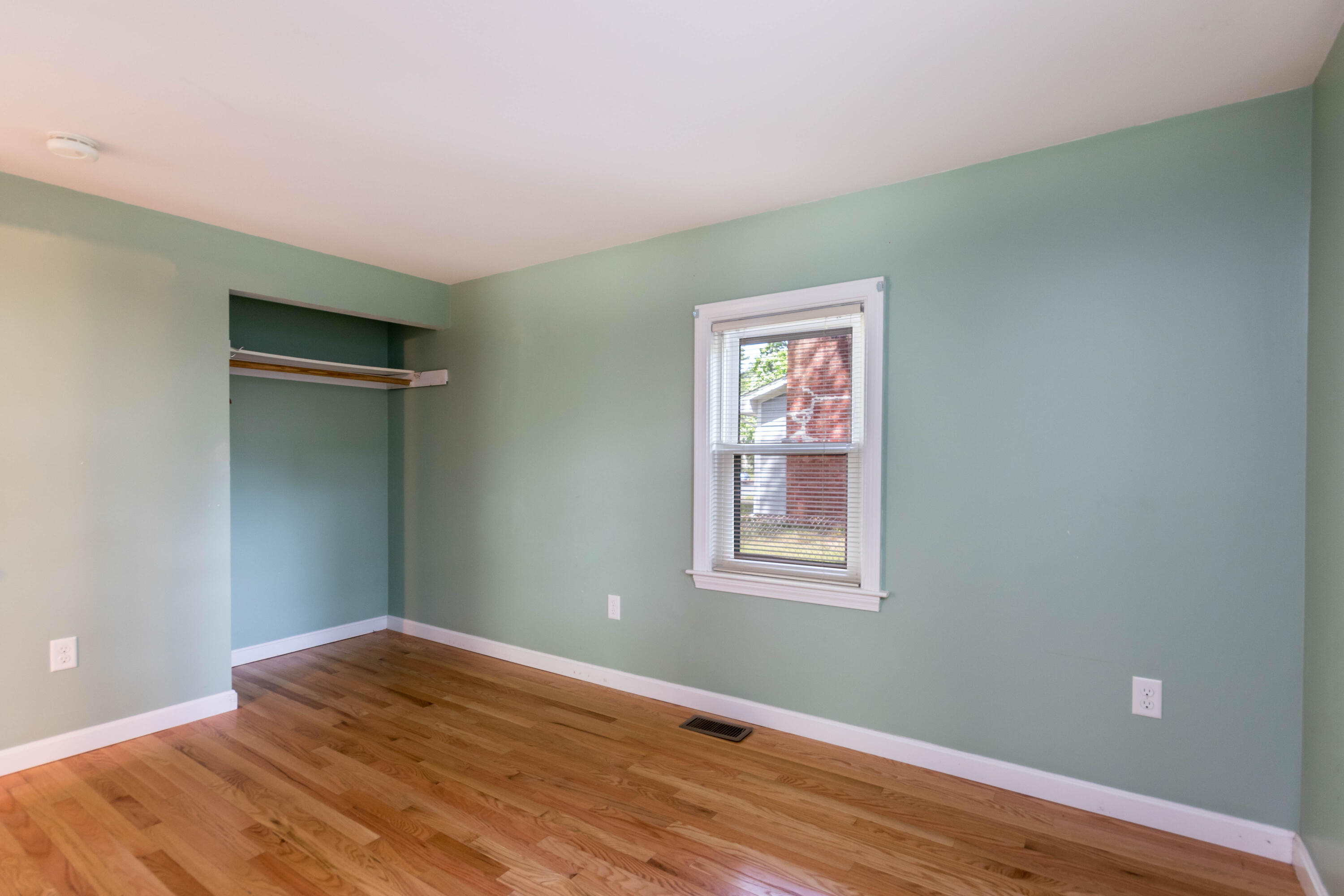 19 Monack Road Wareham, MA 02532 - Photo 14 of 24 a view of empty room with window and wooden floor