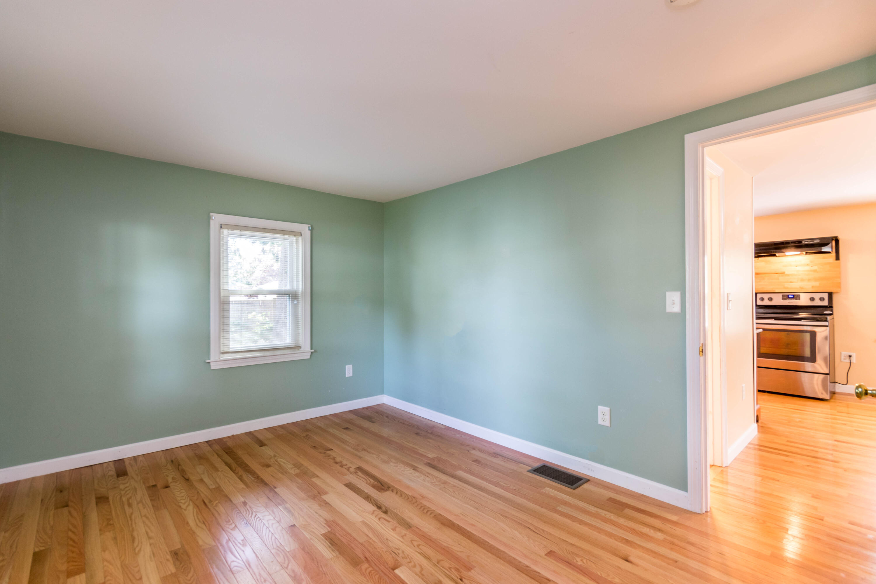 19 Monack Road Wareham, MA 02532 - Photo 15 of 24 a view of empty room with wooden floor and fan
