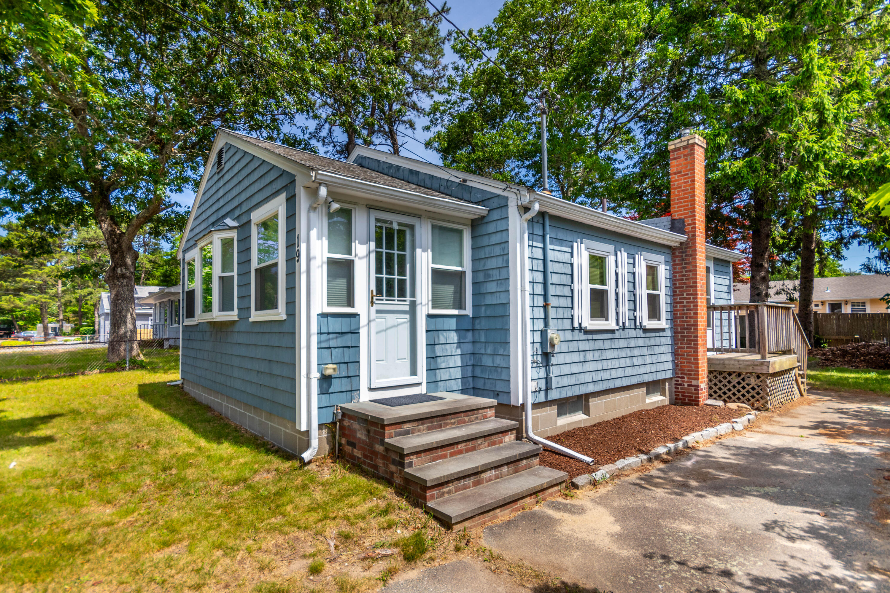19 Monack Road Wareham, MA 02532 - Photo 19 of 24 a front view of a house with a yard