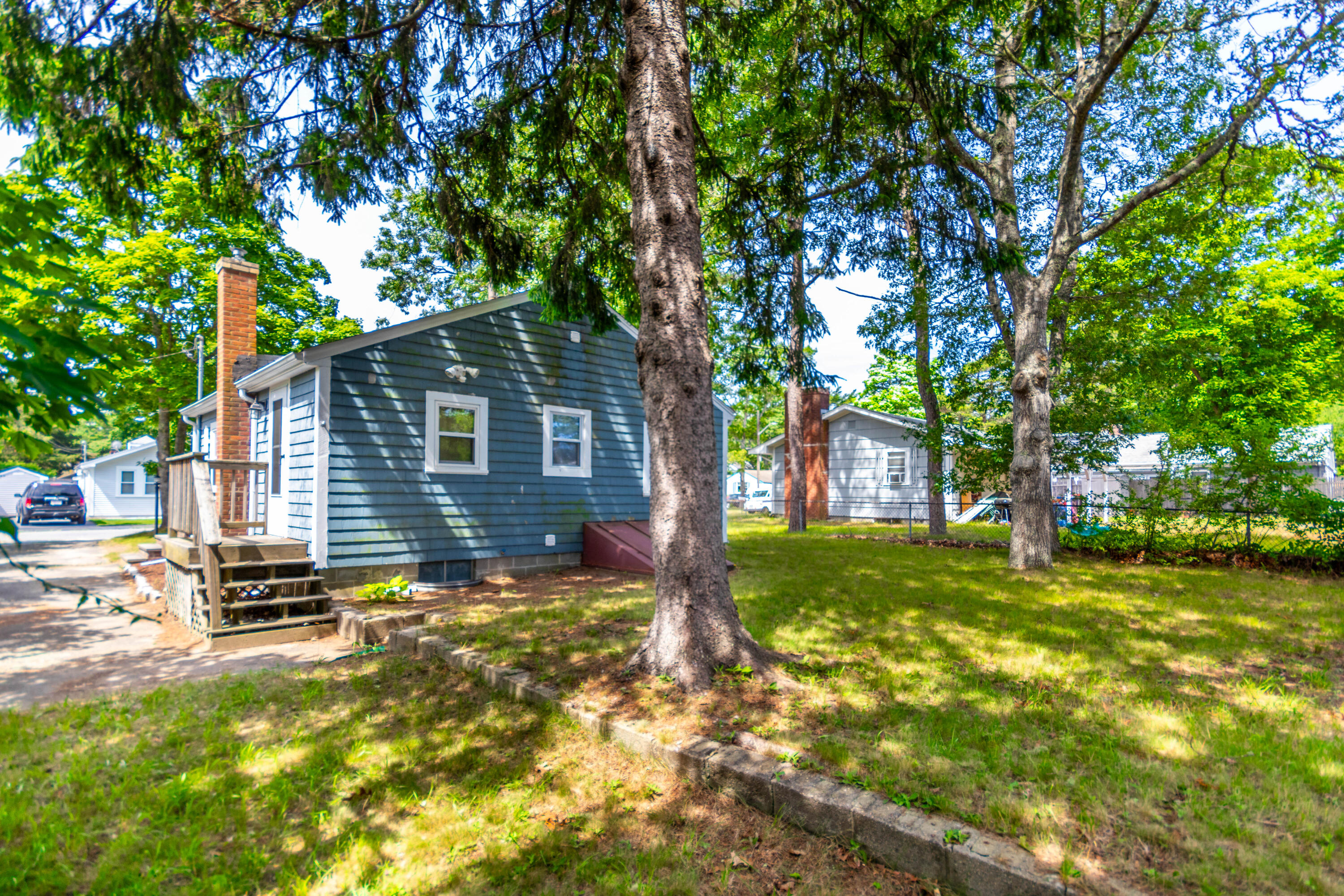 19 Monack Road Wareham, MA 02532 - Photo 21 of 24 a front view of a house with a yard