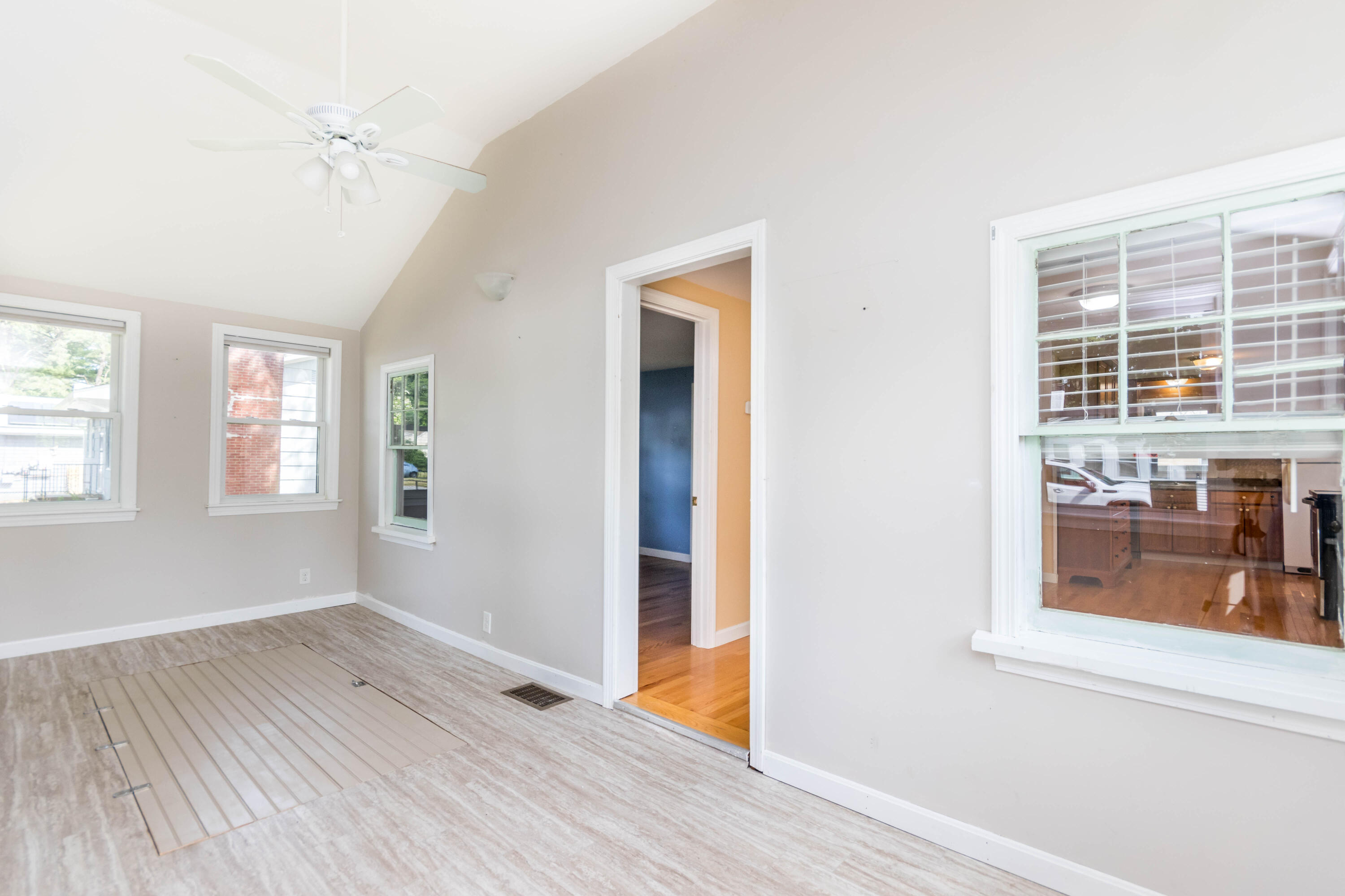 19 Monack Road Wareham, MA 02532 - Photo 5 of 24 an empty room with wooden floor and windows