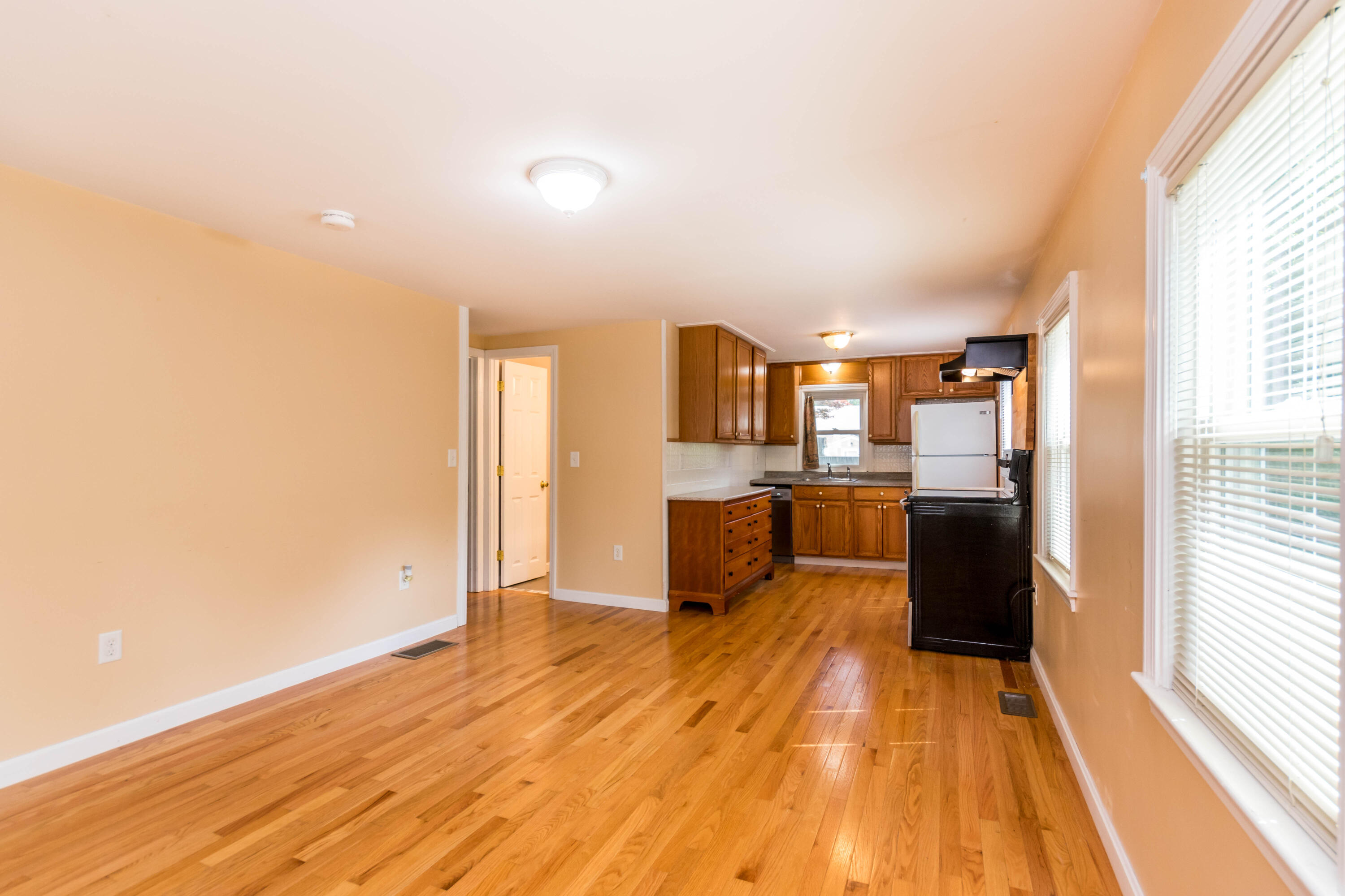19 Monack Road Wareham, MA 02532 - Photo 7 of 24 a view of a kitchen with a sink and cabinets