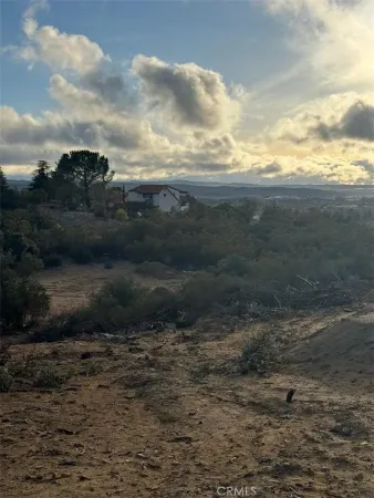 a view of a backyard of a house