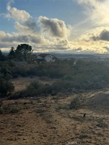 a view of a backyard of a house