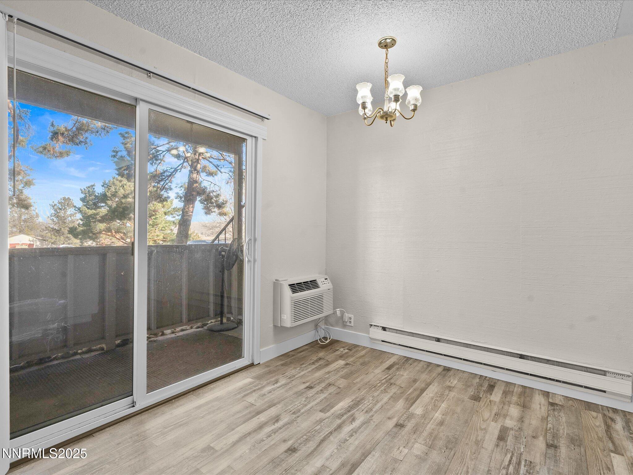 3935 Clear Acre Lane, Unit 215 Reno, NV 89512 - Photo 14 of 31 a view of an empty room with a window