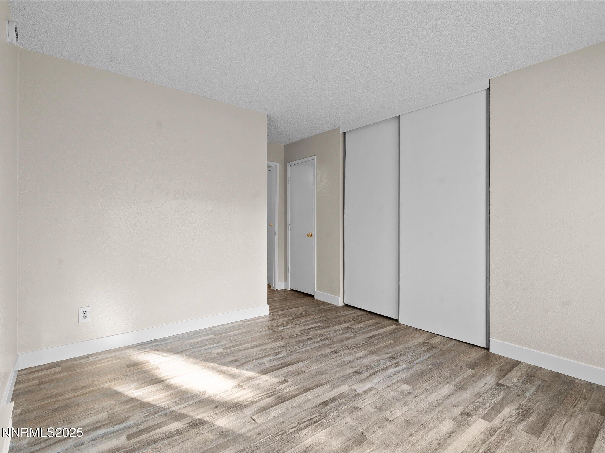 3935 Clear Acre Lane, Unit 215 Reno, NV 89512 - Photo 28 of 31 a view of an empty room