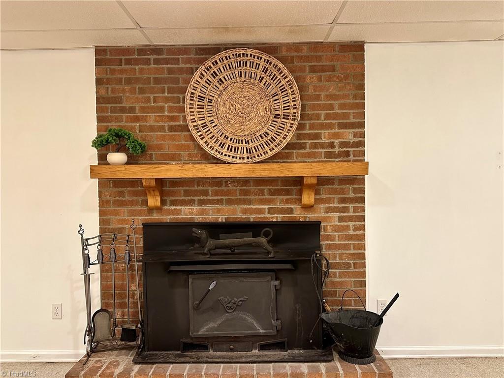 3501 River Ridge Road Pfafftown, NC 27040 - Photo 32 of 50 Basement fireplace