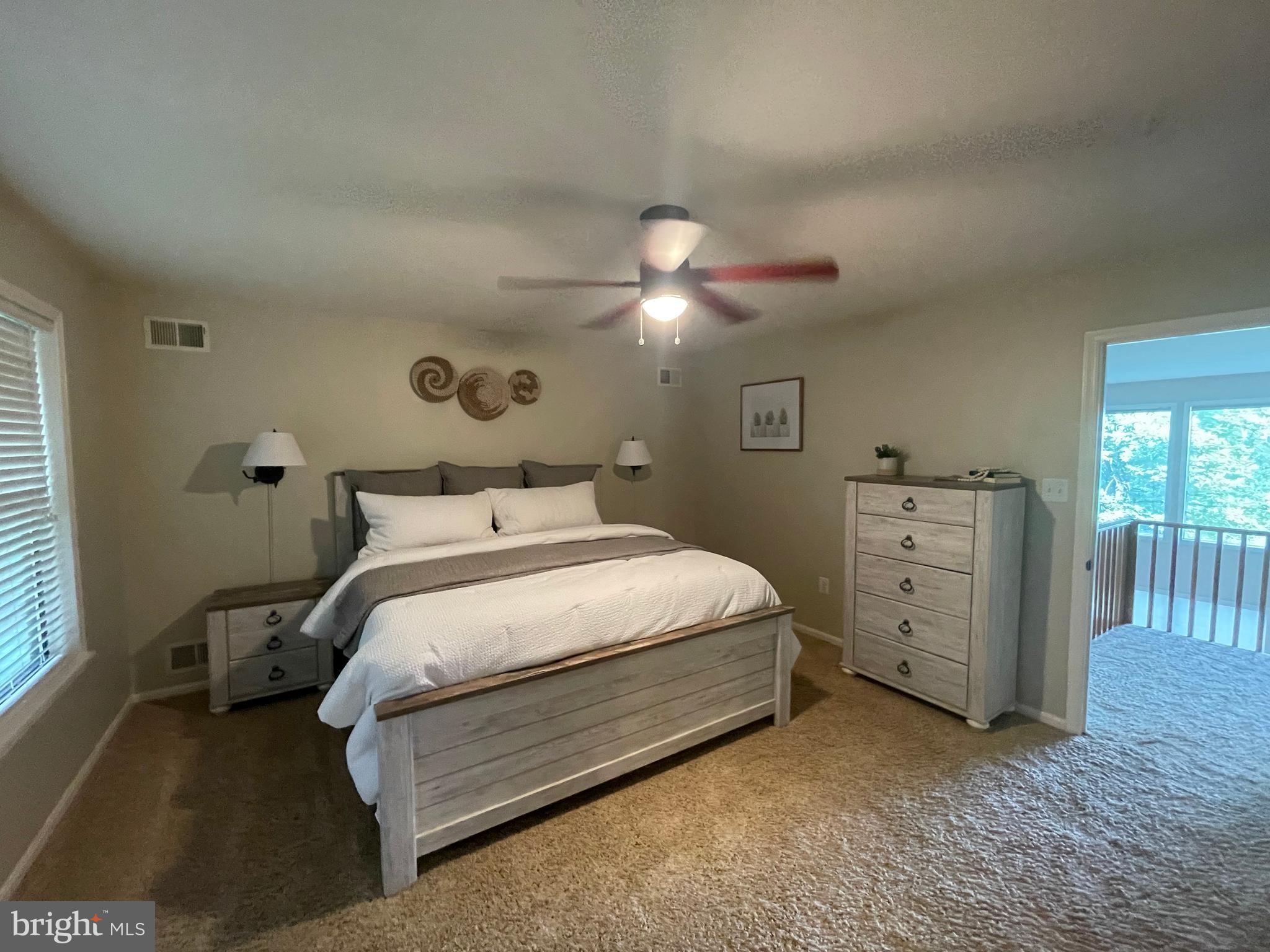 2315 Lookout Road Haymarket, VA 20169 - Photo 17 of 36 a bedroom with a bed and a cabinets