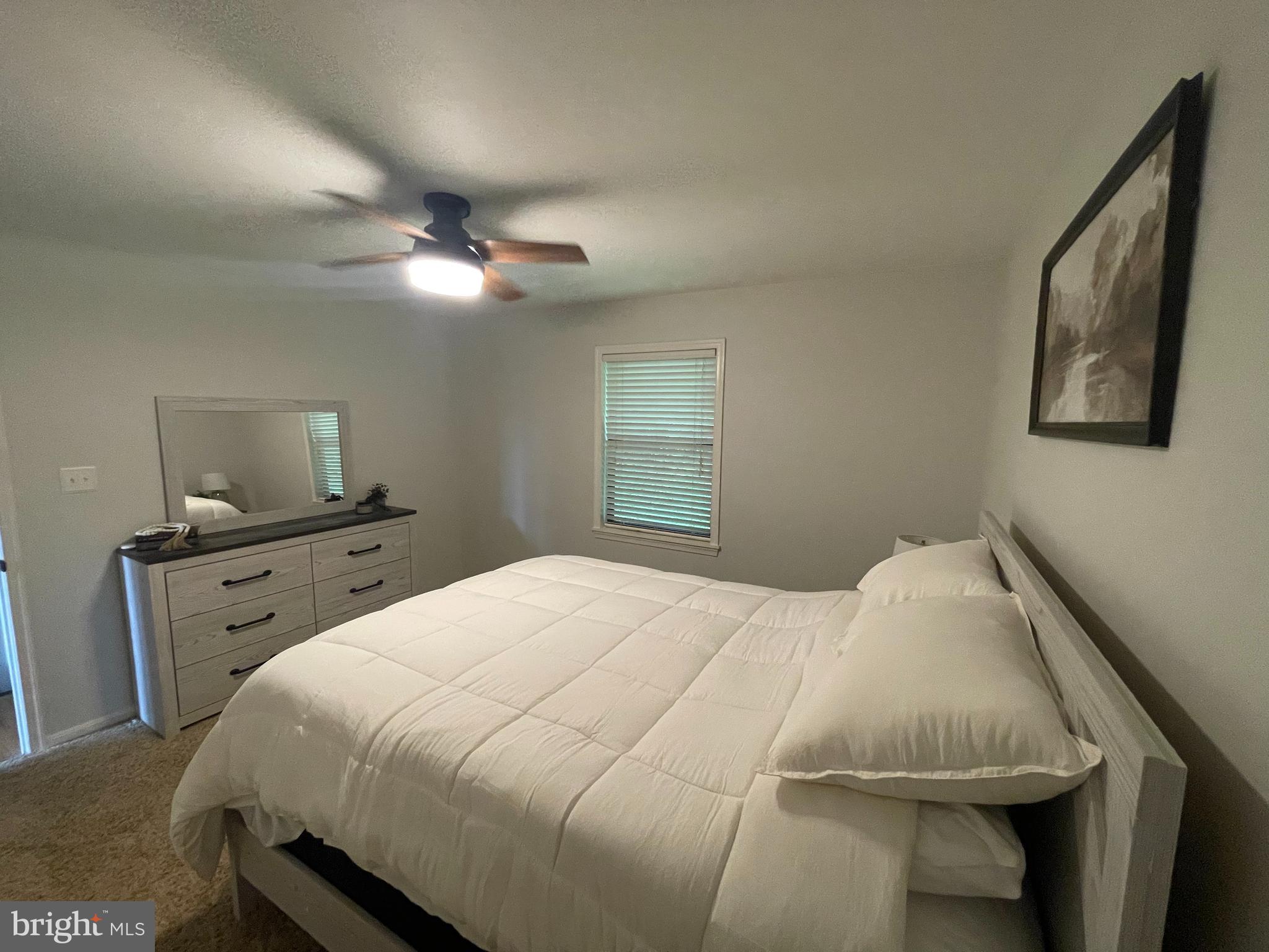 2315 Lookout Road Haymarket, VA 20169 - Photo 28 of 36 a bedroom with a bed and a tv