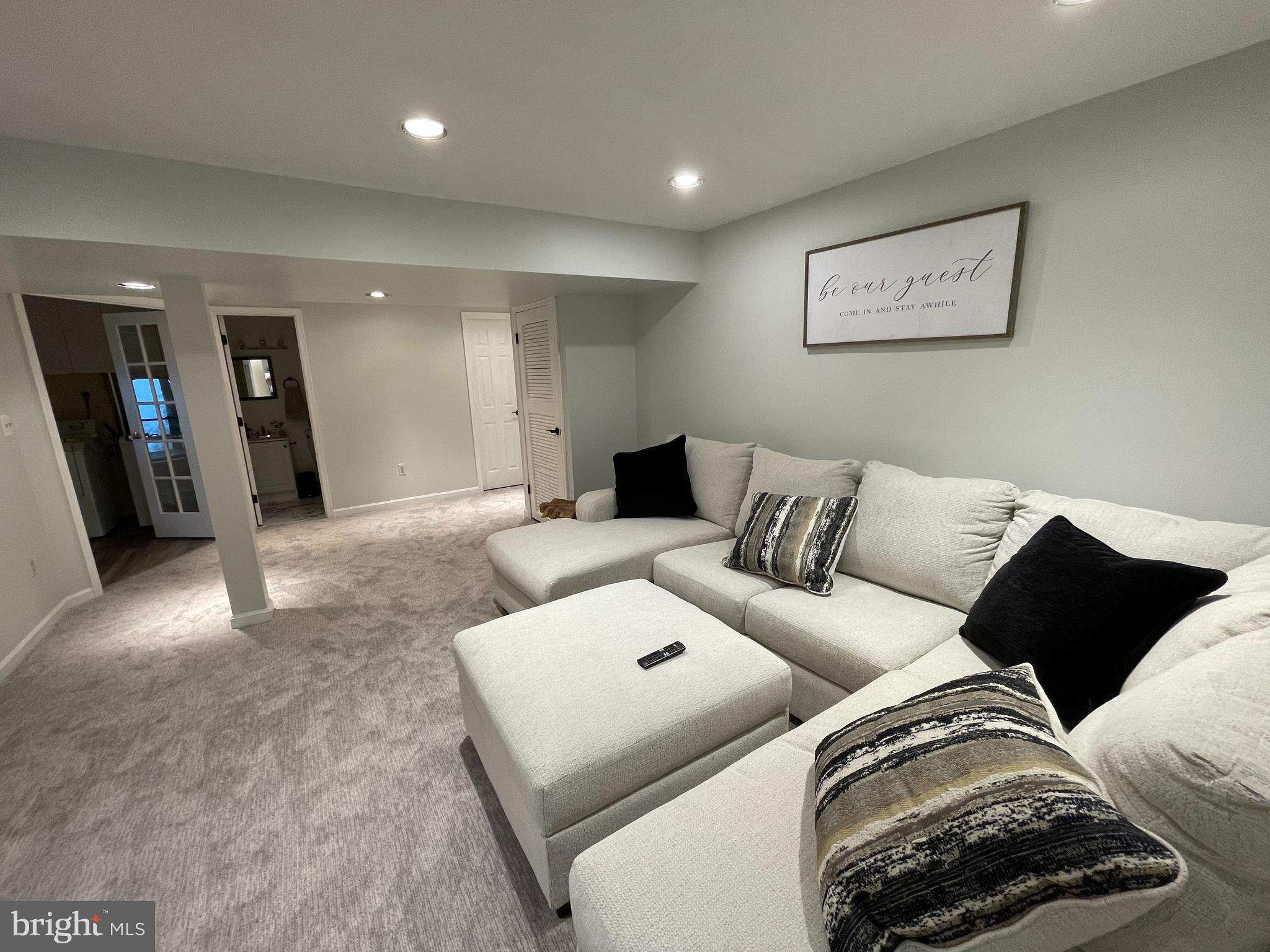 2315 Lookout Road Haymarket, VA 20169 - Photo 32 of 36 a living room with furniture and a walk in closet