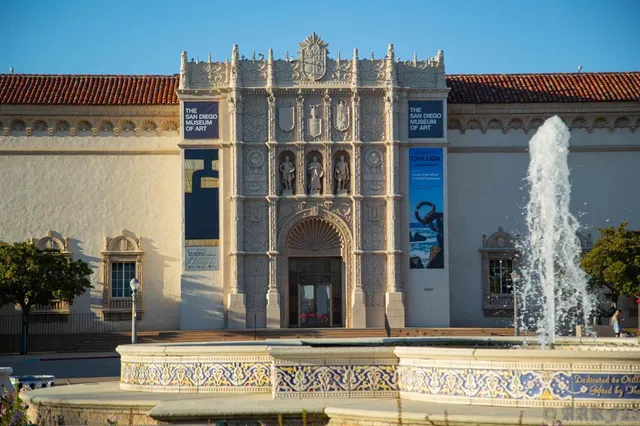 a black and white photo of a swimming pool