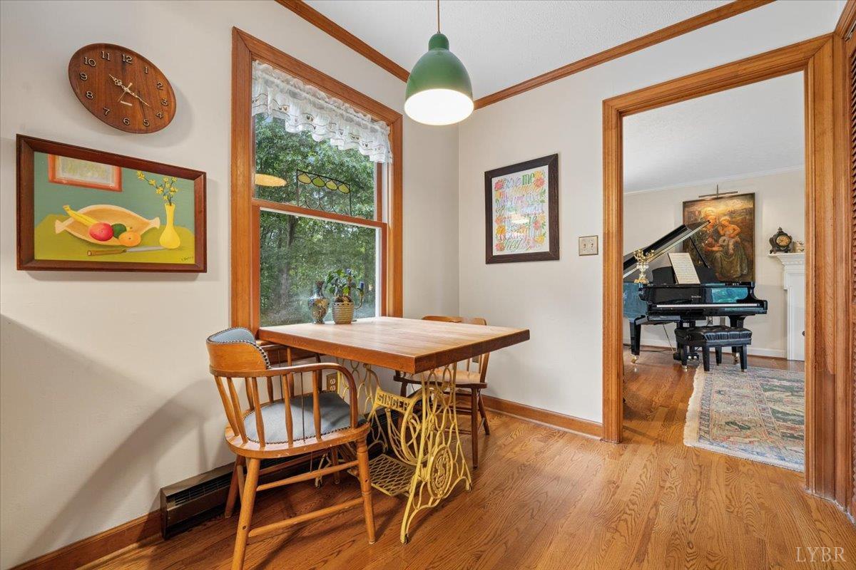 3289 Peaks Road Bedford, VA 24523 - Photo 27 of 71 a view of a dining room with furniture wooden floor and a rug
