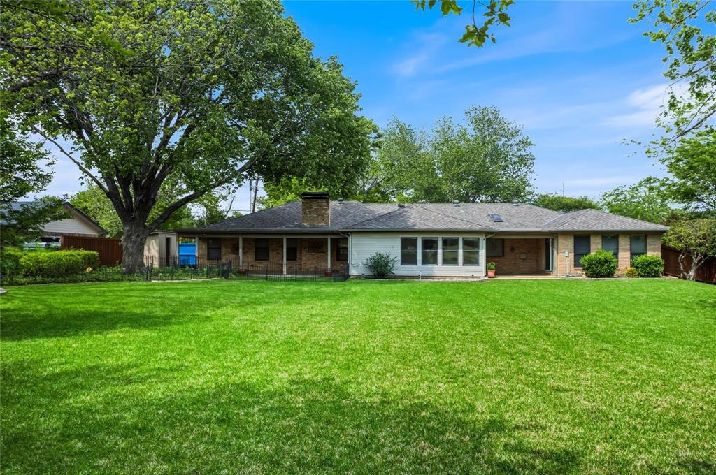 265 East Dove Road Southlake, TX 76092 - Photo 39 of 39 a view of a house with a big yard potted plants and large tree