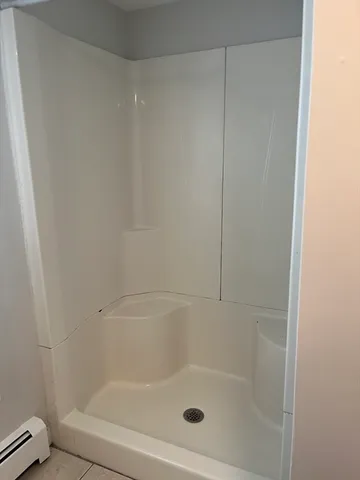 a close view of a bathtub in bathroom
