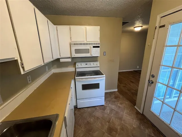 a bathroom with sink and mirror
