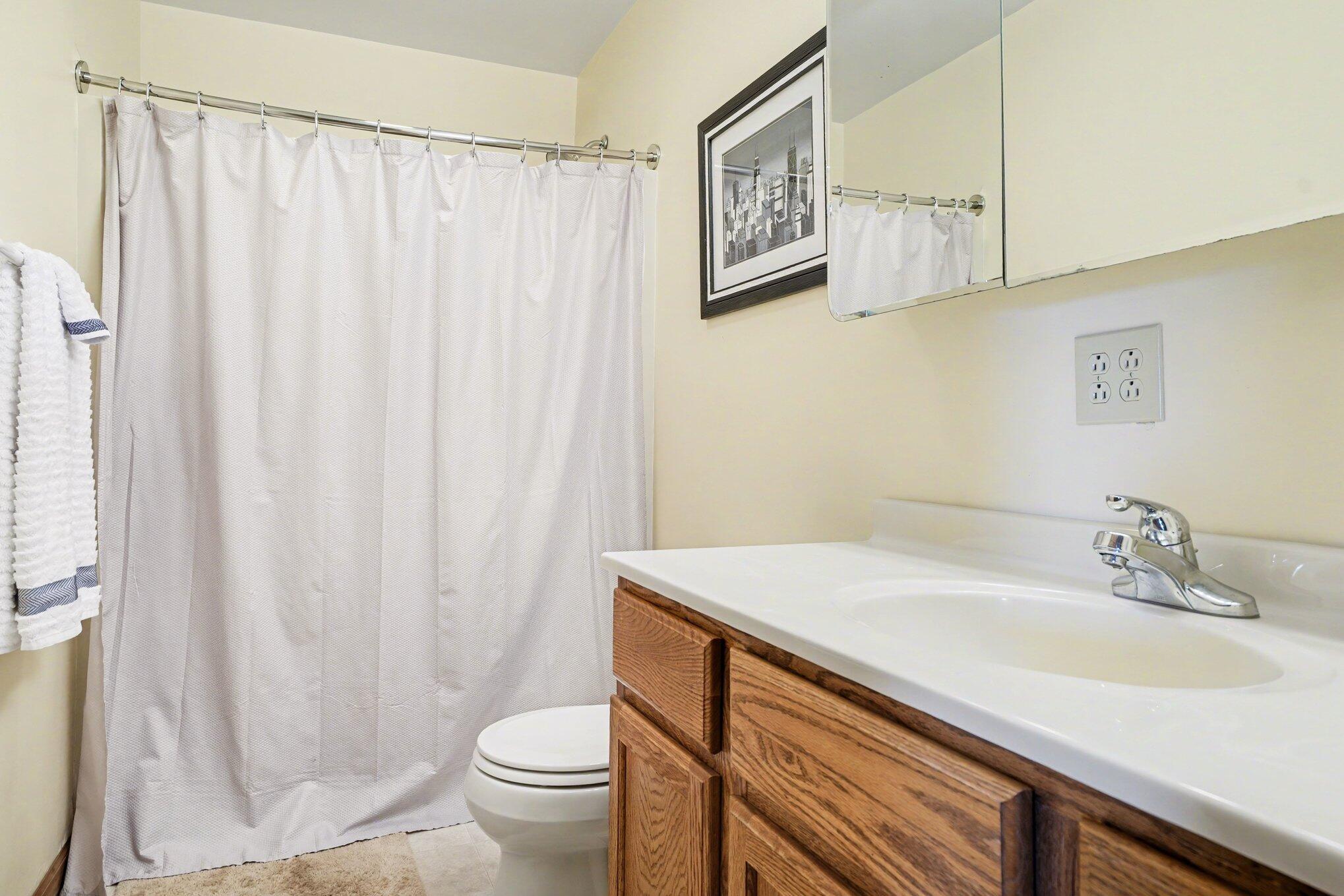 754 South Forrester Road La Porte, IN 46350 - Photo 12 of 33 a bathroom with a sink and a toilet