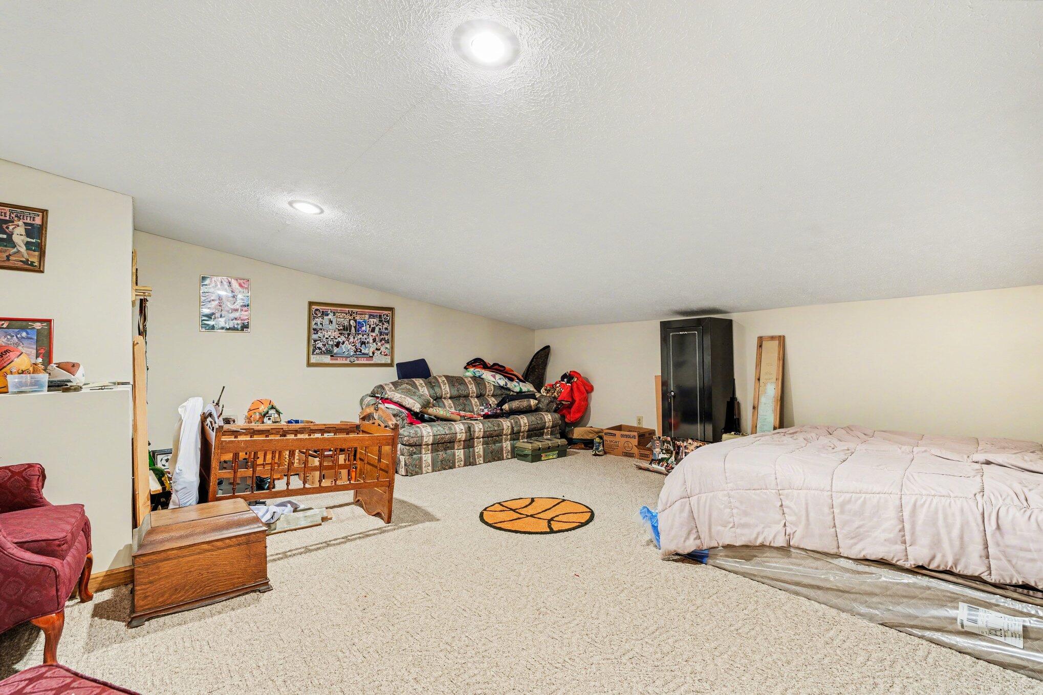 754 South Forrester Road La Porte, IN 46350 - Photo 14 of 33 a bedroom with furniture and a couch