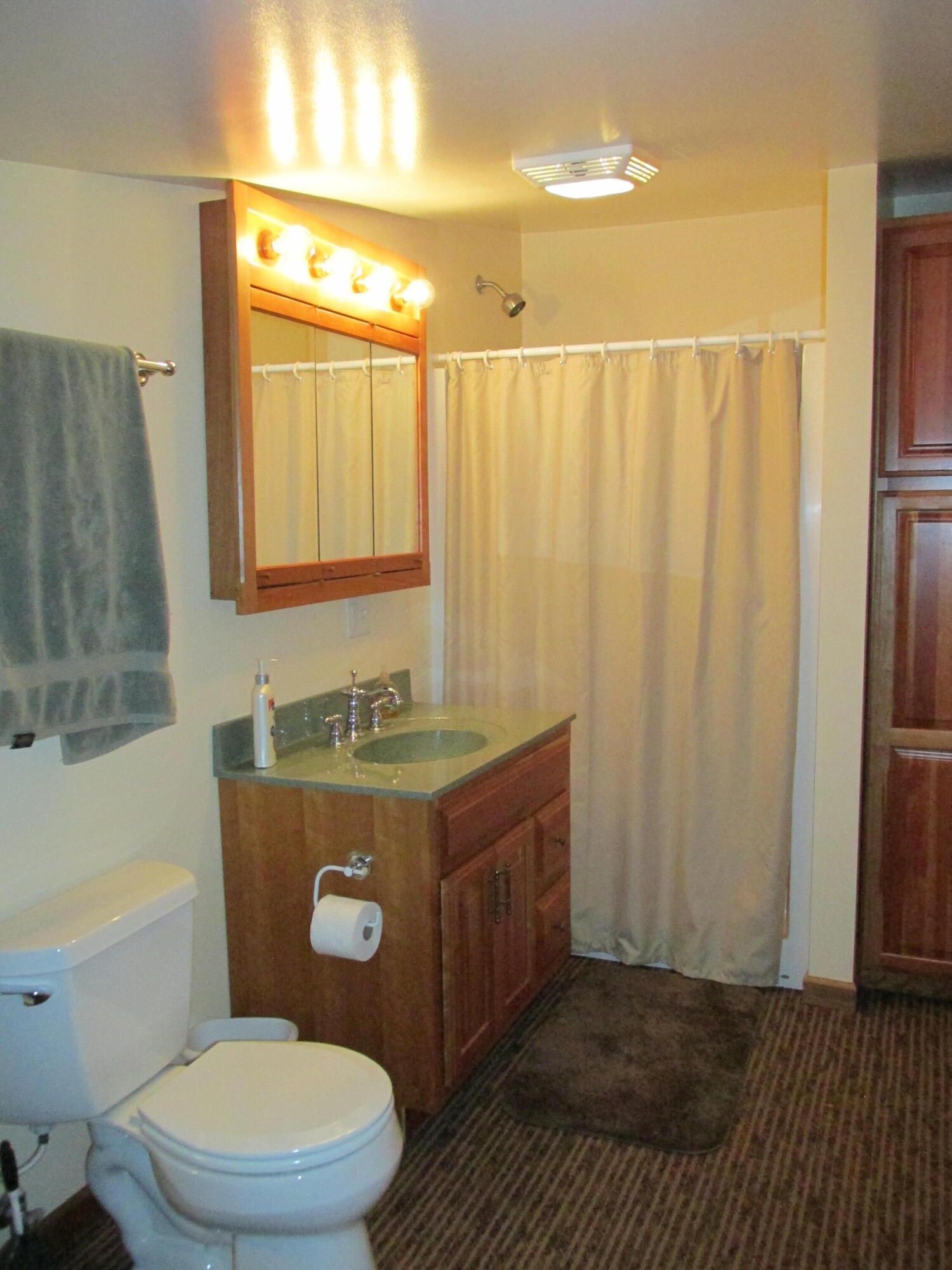 754 South Forrester Road La Porte, IN 46350 - Photo 15 of 33 a bathroom with a granite countertop toilet a sink and a mirror