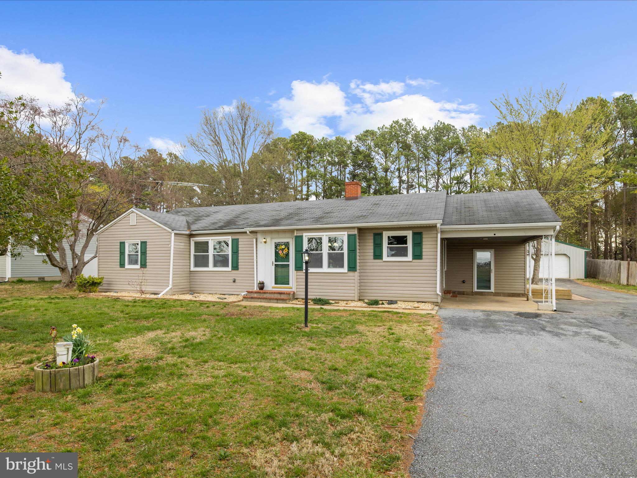 208 Ewingtown Road Church Hill, MD 21623 - Photo 2 of 62 a front view of a house with a yard and trees