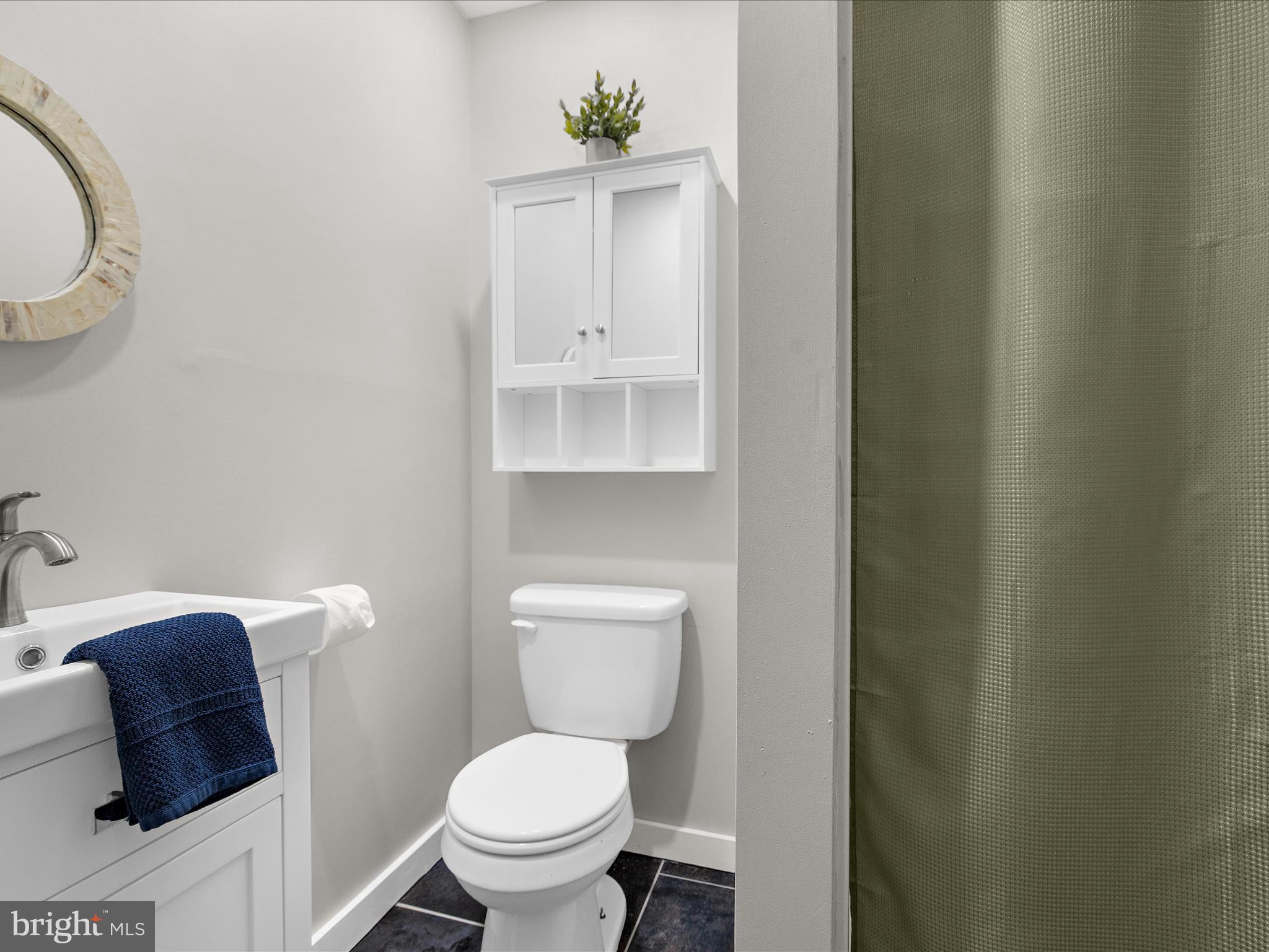 208 Ewingtown Road Church Hill, MD 21623 - Photo 28 of 62 a white toilet sitting next to a shower