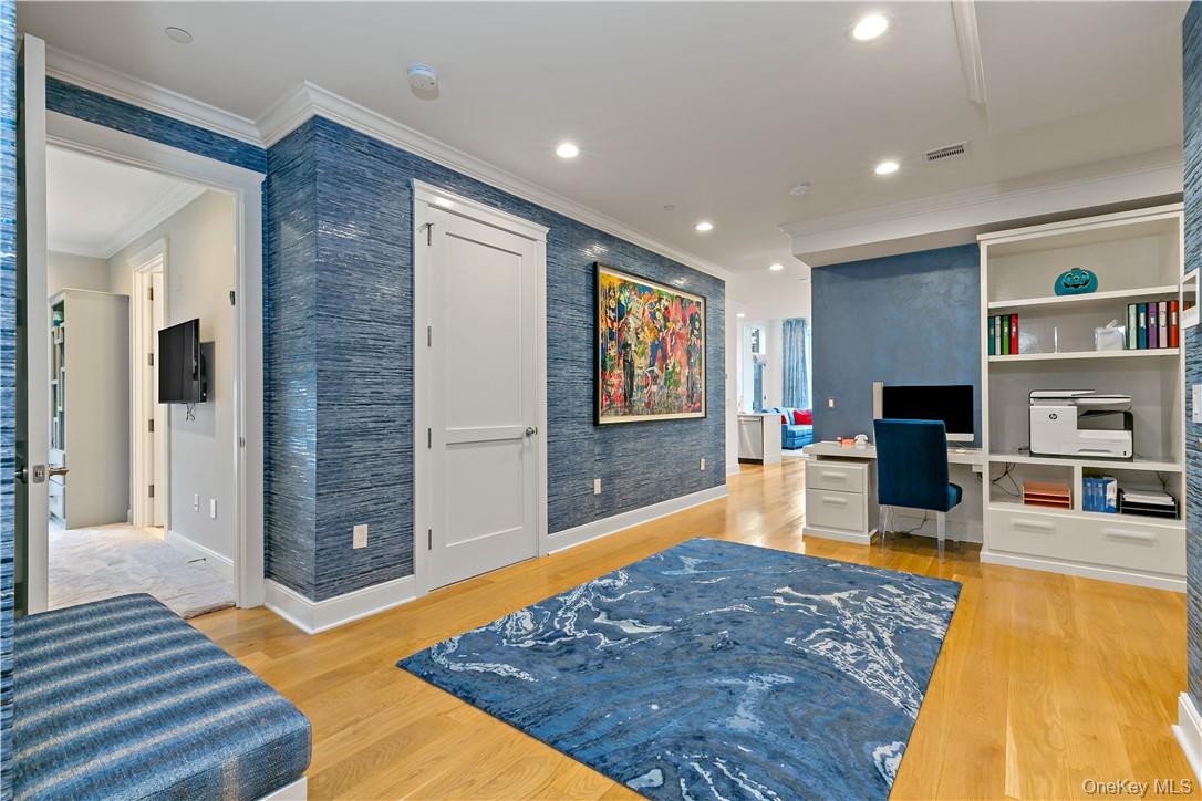 45 Hudson View Way Tarrytown, NY 10591 - Photo 2 of 26 a living room with furniture and a flat screen tv