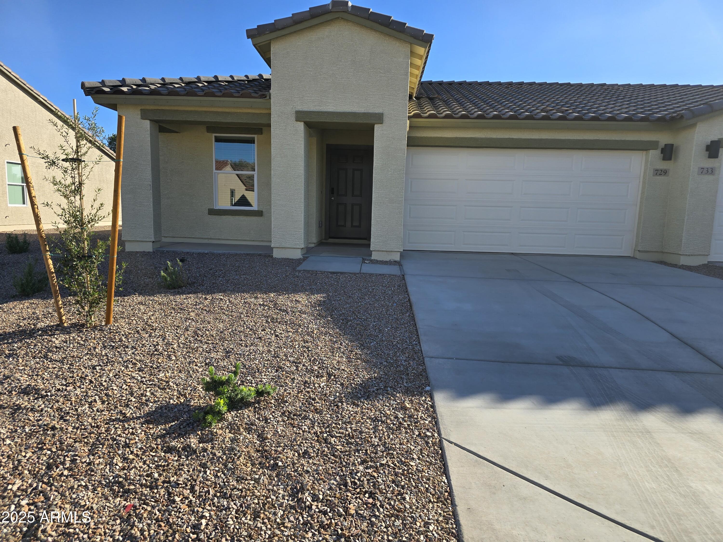 729 Dylan Court Wickenburg, AZ 85390 - Photo 1 of 14 a front view of a house