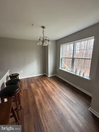 a view of a room with a window