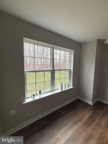 a white bath tub sitting in a bathroom